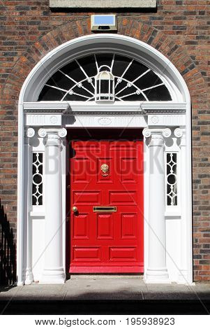 A red georgian door in Dublin, Ireland