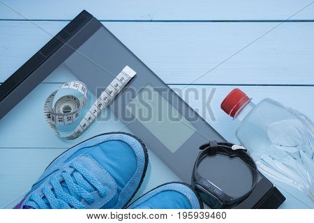 Blue Sneakers, Water, Digital Scale On Blue Background