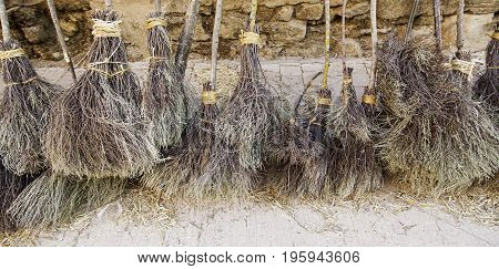 Detail of brooms for witches on halloween objects for flying halloween party witchcraft