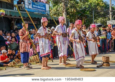CHIANGMAI THAILAND - JANUARY 25 2015: Hill tribe traditional group dance show in parade of 22nd Traditional Skirt Fabric and The Indigenous Product and Culture Festival in Mae Chaem Chiangmai Thailand