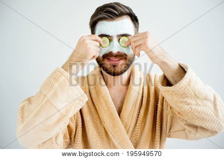 A portrait of a man with a mud mask