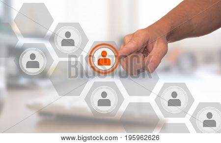 Man hand selects a virtual candidate among other competitors