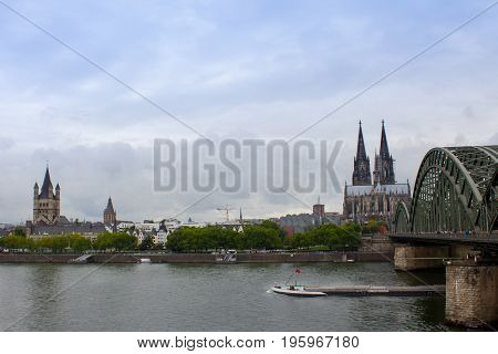 View of Cologne cathedral and Hohenzollern bridge over Rhine river Germany