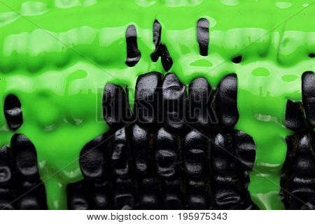 Black Corn With Pouring Green Paint Background, Macro Closeup.texture
