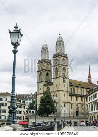 Zurich, Switzerland - August 9, 2007: Downtown City Square With Grossmunster Old Church And Street