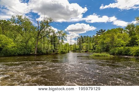 Flowing Apple River in Amery Wisconsin USA.