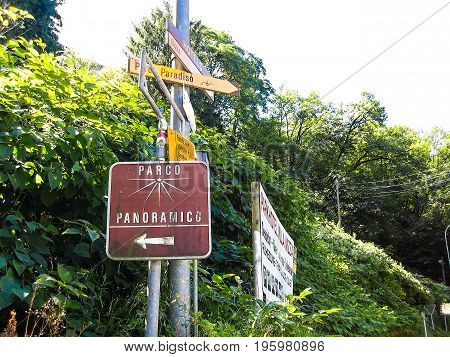 Downtown city with signs for Panoramic view and directions during sunny summer day in Lugano Switzerland