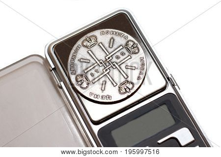Antikvariat. Antique Iron Coins On The Scales