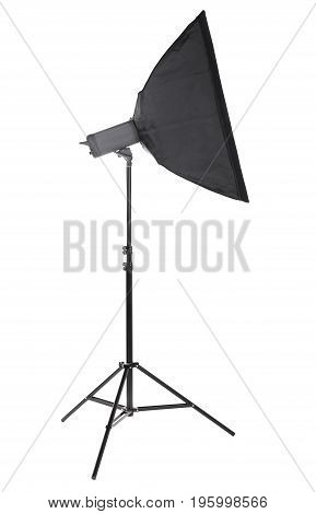 A stylish strip softbox for a photo studio, isolated on a white background. Professional photographic technology. A new saturated black tripod. High resolution.