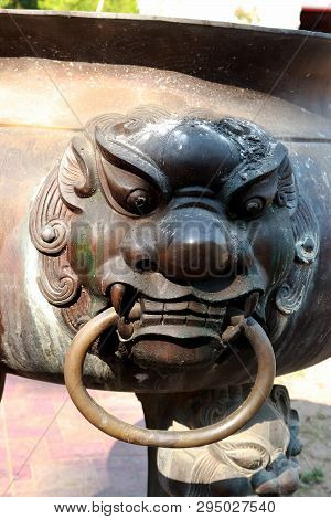 Singha Statue On Old Joss Stick Pot Ncense Burner.