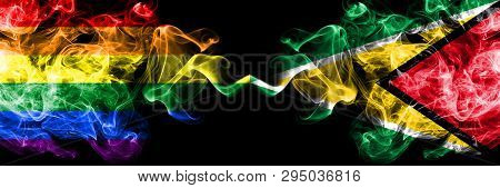 Gay Vs Guyana, Guyanese Smoke Flags Placed Side By Side. Thick Colored Silky Smoke Flags Of Pride An