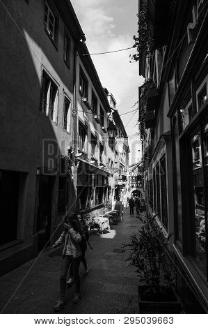 Strasbourg, France - Apr 19, 2016: Cute Street Tiny Vintage Timbered Houses Buildings In Central Str