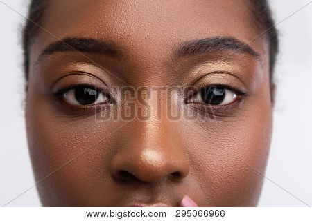 Dark-skinned Young Woman With Nice Golden Eyeshades