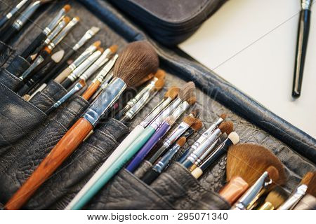 Workplace Make-up Artist Special Brushes To Create An Image And Make-up Leather Case On The Table. M