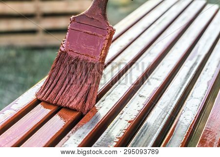 Paint Application By Brush On Metal Structures. Protective Coating Of Steel Closed Profiles With Pri