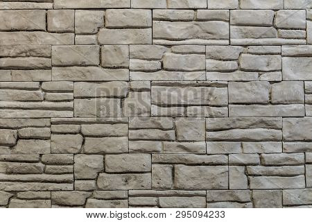 Gypsum Facing Tile On The Wall. Construction Material.