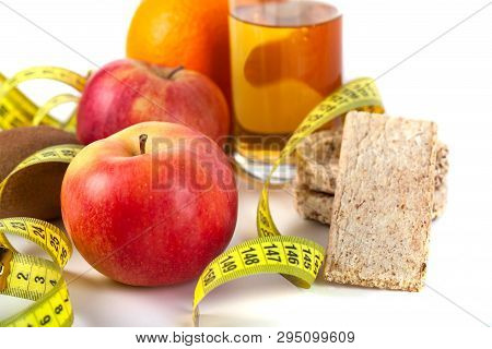 Apple, Orange, Kiwi With Measure Tape On White Background