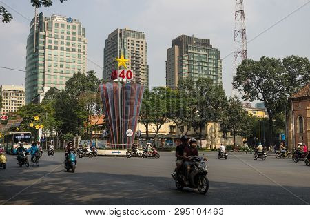 Ho Chi Minh, Vietnam - January 17, 2015: Traffic On Square Behind Saigon Notre-dame Cathedral Basili