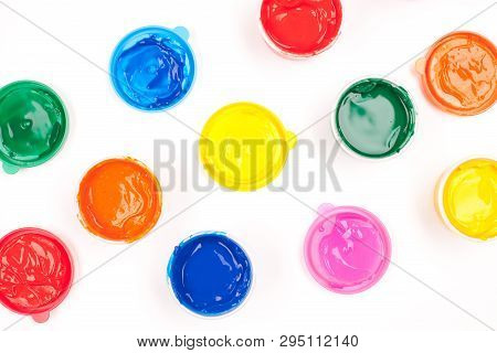 Motley Paints On The White Background. Studio Shot