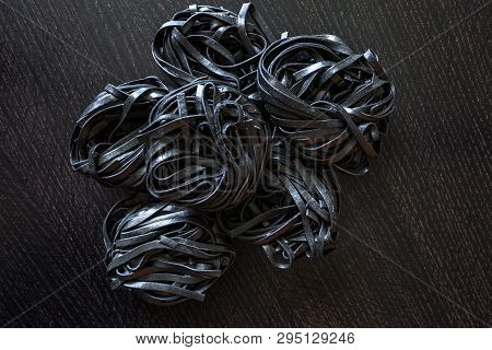 Black Pasta With Cuttlefish Ink. Pasta Of Durum Wheat Semolina With Squid Ink