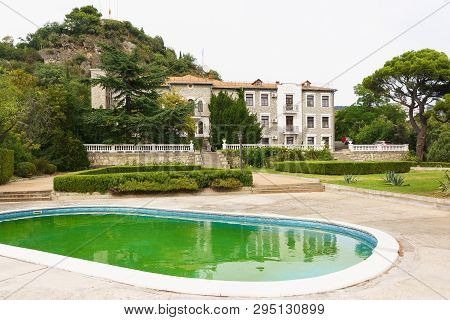 Koreiz, Yalta, Crimea, Russia - September 13, 2018: Golitsyn Palace Building, Trimmed Shrubs And Dec