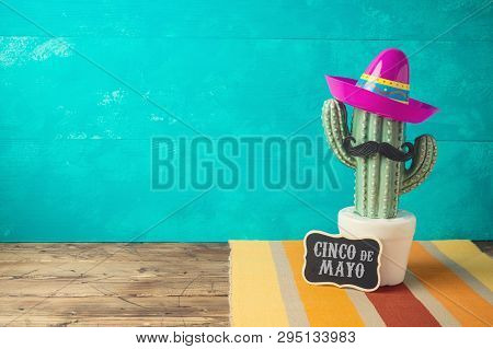 Cinco De Mayo Holiday Background With Mexican Cactus And  Party Sombrero Hat On Wooden Table