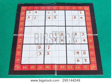 Moscow, Russia - April 2, 2019: Paper Playfield Of Sudoku Board Game On Green Baize Table. Sudoku Is
