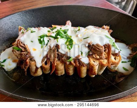 Turkish Food Silor / Siron / Ziron Rolled Raw Dough And Fried Phyllo With Yogurt And Meat Homemade F