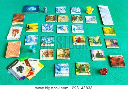 Moscow, Russia - April 3, 2019: Gameplay Of Forbidden Island Cooperative Board Game (russian Edition