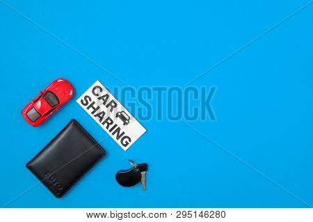 Car Sharing Concept With Toy Car, Auto Drive License, Car Key, Text Sign 