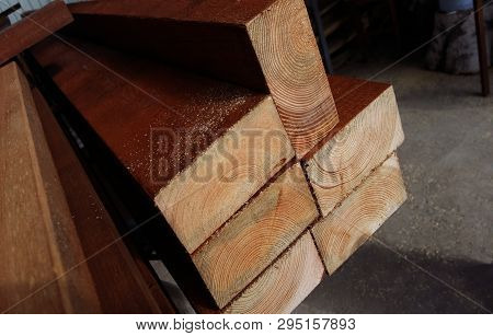 Wood background. Wood texture. Pine ends. Background ends of the boards. The ends of the lumber.