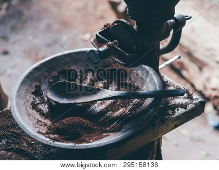 Roasted Coffee Bean With Brown Metal Vintage Antique Grinder Coffee With Handle. Traditional Old Mil
