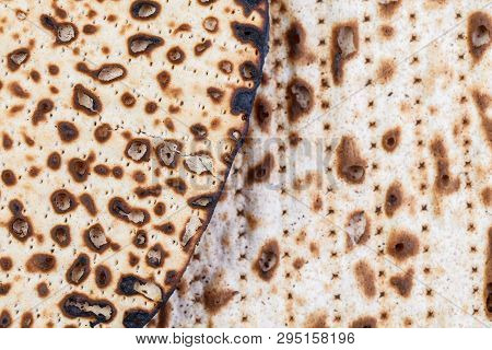 Matzah. Jewish Traditional Passover Bread. Pesach Celebration Symbol. Isolated On White. With Some F