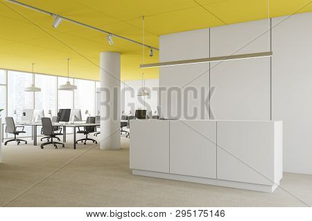 Side View Of Reception In Yellow Ceiling Office