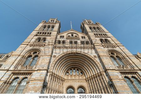 A Wide View Of The Front Of The Natural History Museum In London On A Bright Day