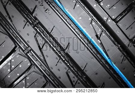 Studio Shot Of A Set Of Summer Car Tire On Black Background. Tire Stack Background. Car Tyre Protect
