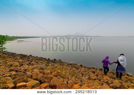 Child And Mother At Baranti Dam. Baranti Is A Village In Purulia District , With A Water Reservoir U