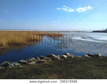 The Shore Of The Lake Rocks Grass Spring Melt Ice