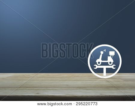 Service Fix Motorcycle With Wrench Tool Flat Icon On Wooden Table Over Light Blue Gradient Backgroun