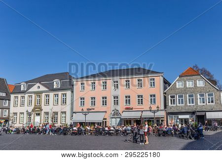 Lippstadt, Germany - March 22, 2019: People Enjoying The Sun At The Market Square In Lippstadt, Germ