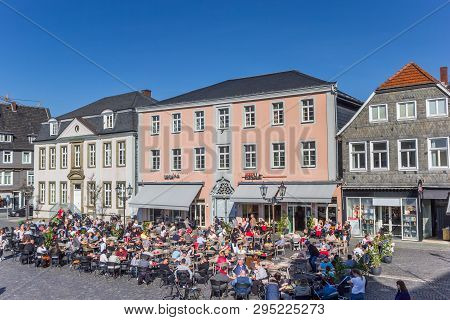 Lippstadt, Germany - March 22, 2019: People Enjoying The Sun At The Market Square In Lippstadt, Germ