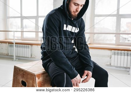Sweaty Strong And Muscular Man While His Resting After Intensecross Work Session In Fitness Gym. Pro