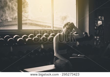 Fit Asian Woman Tired And Relax After The Training Session,female Taking A Break After Exercise And 