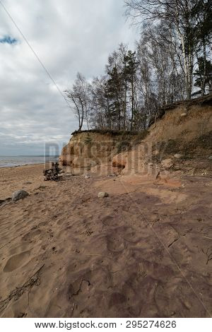 Limestone Beach At The Baltic Sea With Beautiful Sand Pattern And Vivid Red And Orange Color - Touri