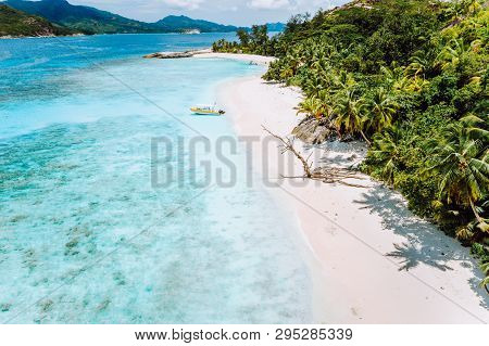 Daytrip To Therese Island. Mahe. A Aerial Drone View From Blue Lagoon And Lonely Tourist Boat Get As