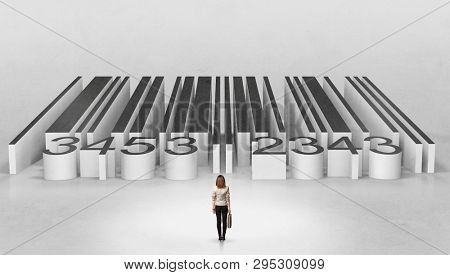Young businessman standing in front of a big codebar