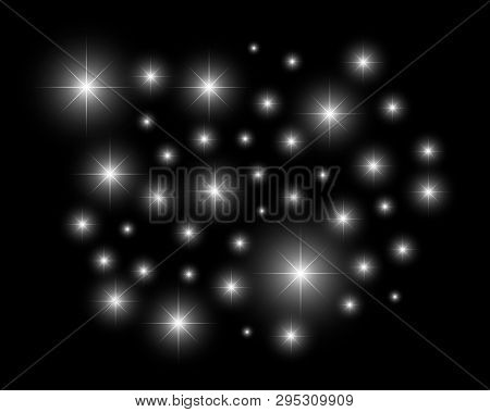 Glitter Effect With Black Isolated Background. White Magic Shine Decorative Elements.