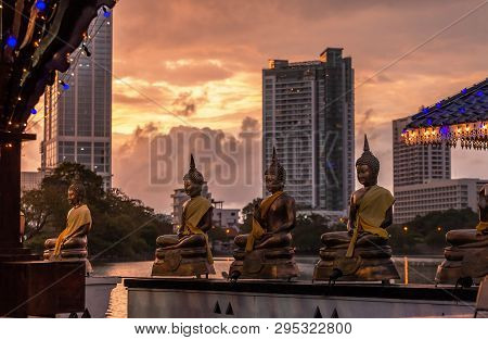 Buddhist Temple In The Beira Lake In Colombo, Sri Lanka At Sunset. Seema Malaka Is A Part Of The Gan