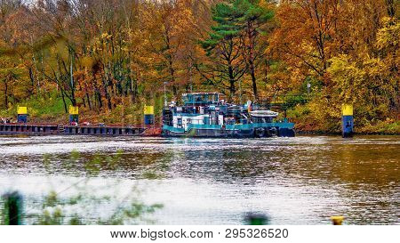 All The Colors Of Autumn By The River, The Ship Moored To The Shore