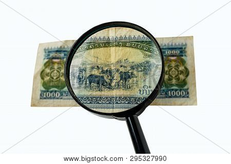 One Thousand Laos Kip Bill And A Magnifying Glass Isolated On A White Background, Reverse Side